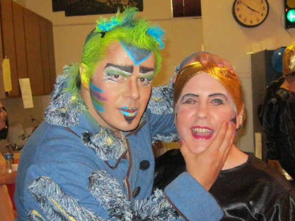 Papageno and Third Priest backstage